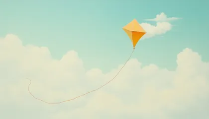 Un cerf-volant orange vole haut et stable dans un ciel dégagé, relié par un long fil